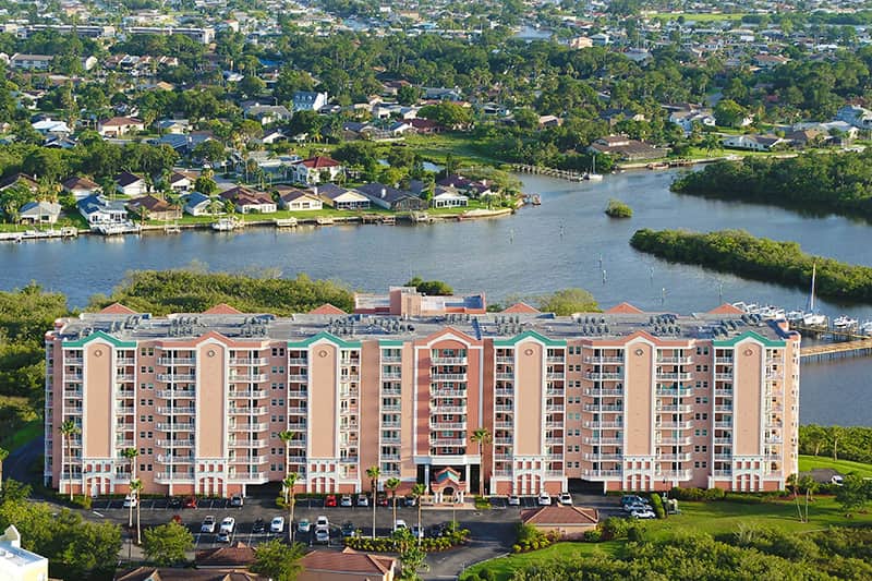 aerial drone photo of a waterfront condominium building in pinellas county