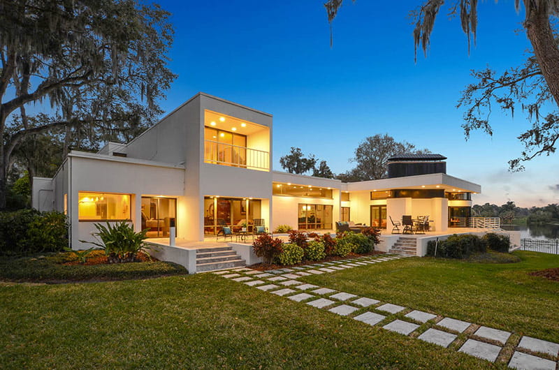 exterior backyard twilight photo of an old carrollwood real estate listing