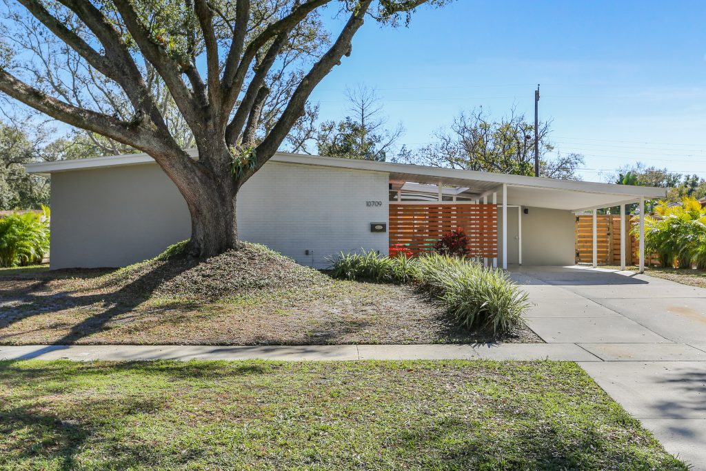 exterior front photo of a mid century modern old carrollwood home