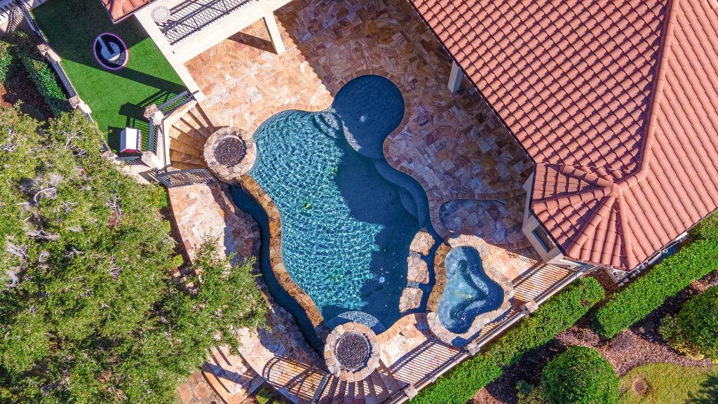 Aerial drone photograph of a pool and spa