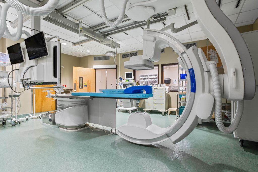 photo of blue cord MRI machine in a hospital